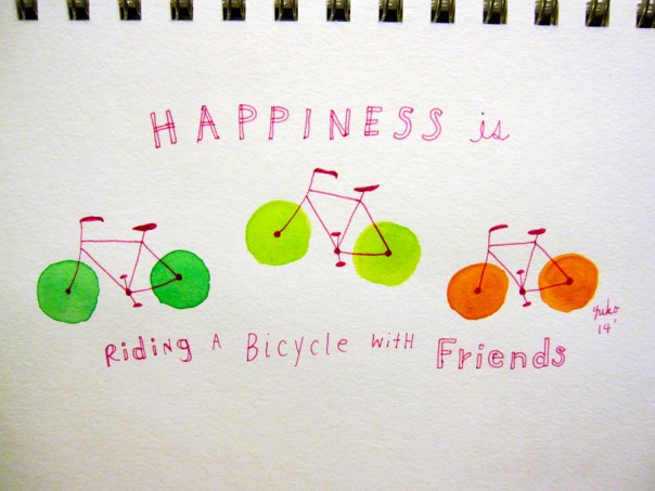 Happiness is riding a bicycle with friends.