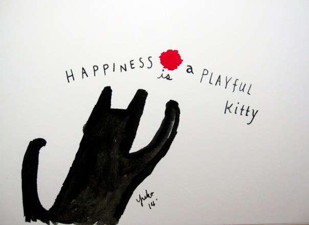 Happiness is a playful kitty.