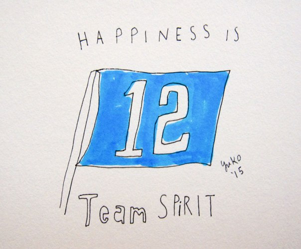 Happiness is team spirit. I'm not even a sports fan, but it was a great game! Go Hawks!